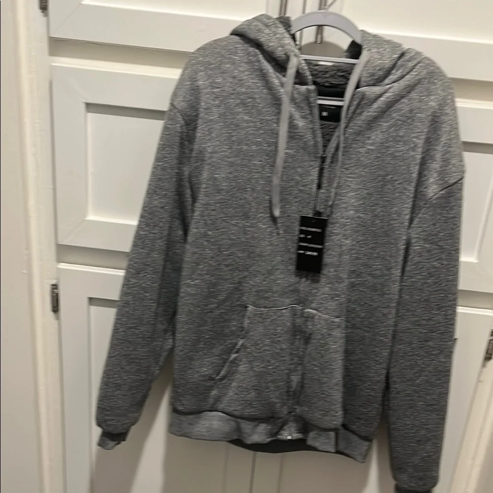 Gray Zip-Up Hoodie size Medium ❤️